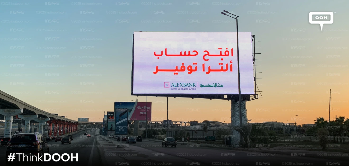Cairo Commuters Greeted by ALEXBANK's Cheerful Pink Billboards Promising 21% Value