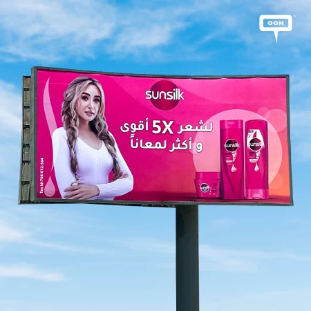 Hannah El Zahed Recommends Sunsilk for 5X Stronger and Shinier Hair on a Pink Billboard