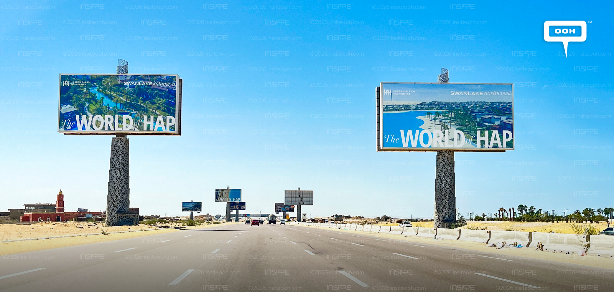 Swan Lake North Coast billboards by Hassan Allam Properties using project imagery along the highway