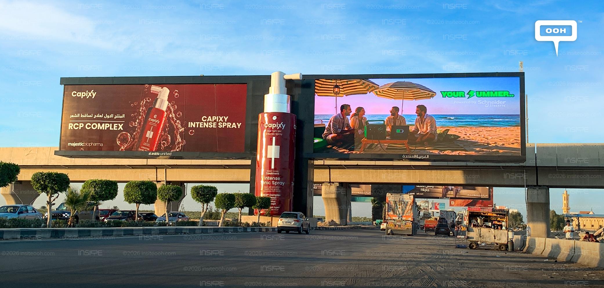 Majestic BioPharma Capixy campaign with an oversized 3D spray bottle installation mounted between two billboards